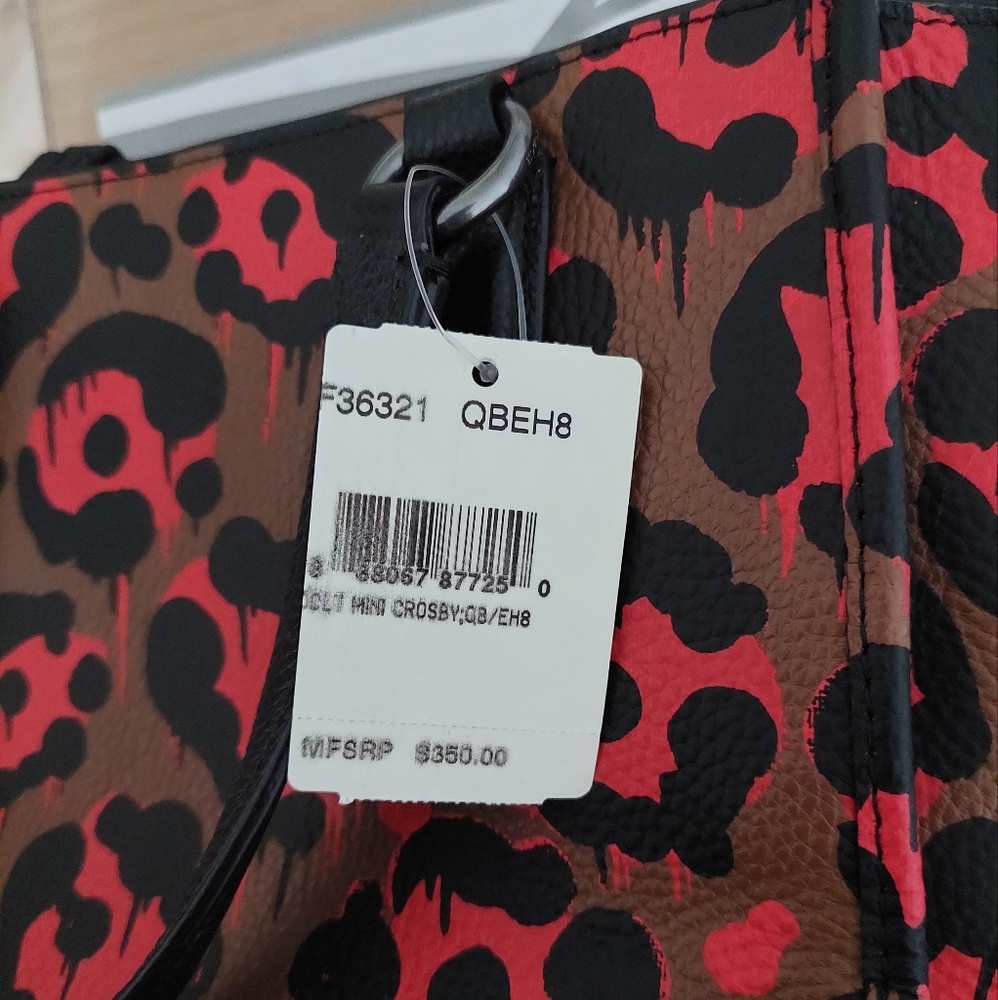 Coach crossbody carryall with leopard ocelot print